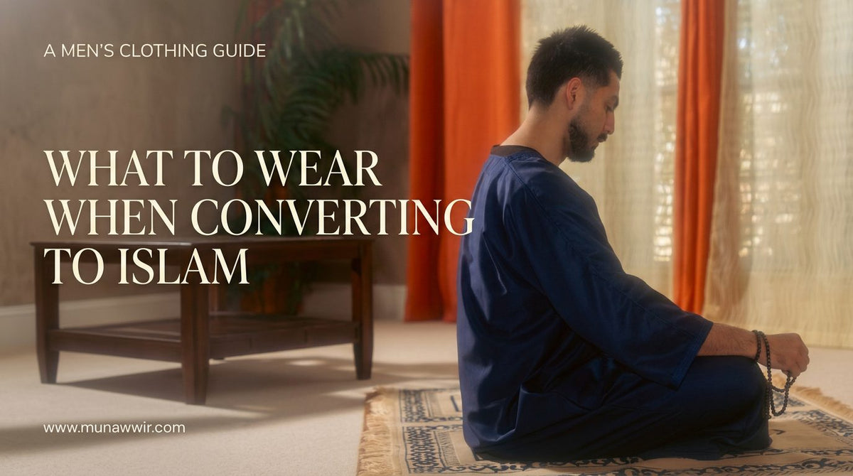 Man sitting in prayer wearing a deep blue Moroccan kaftan, cover image for a guide to what to wear when converting to Islam