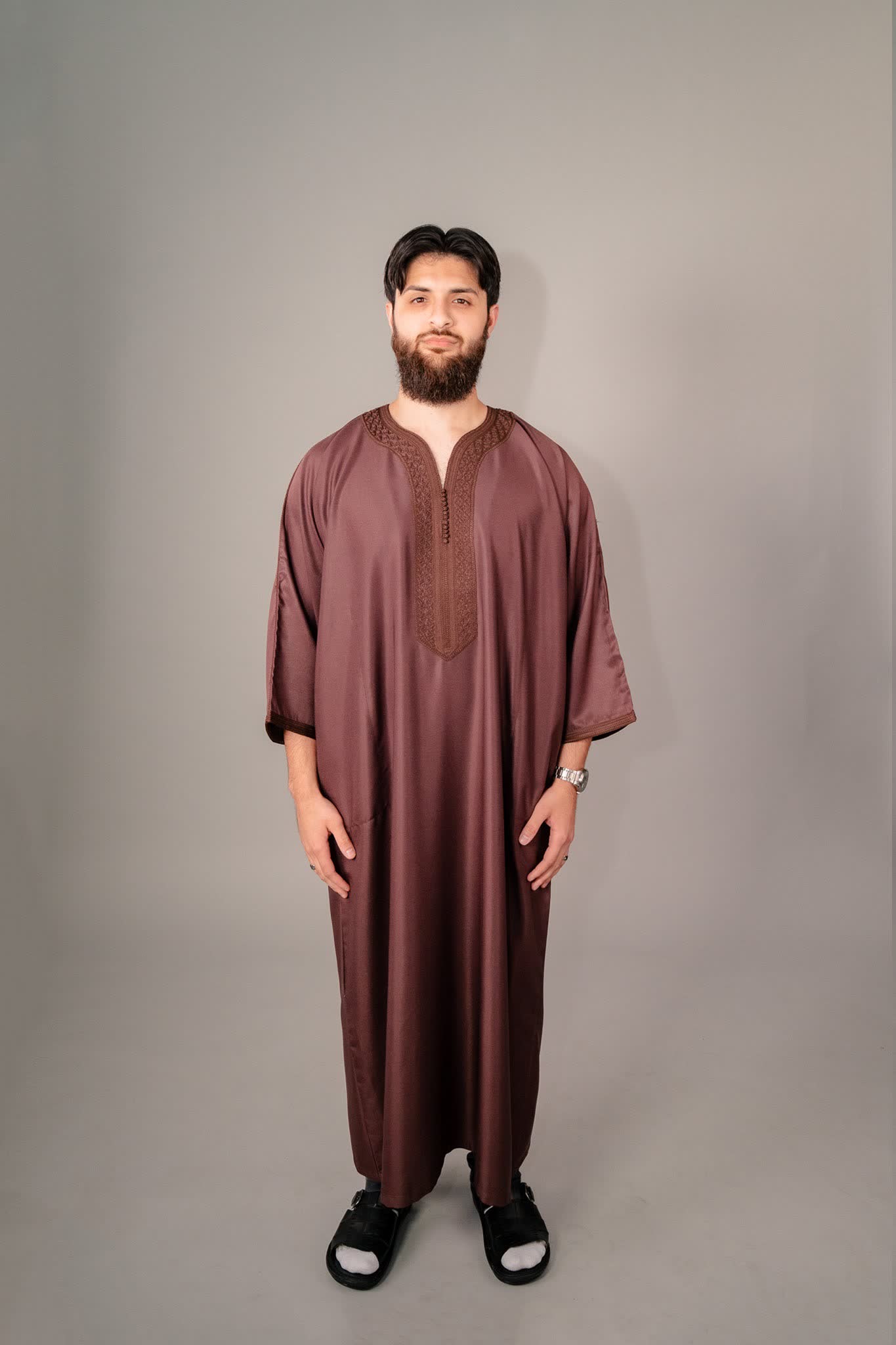 Man wearing a brown Moroccan gandoura for men, front view