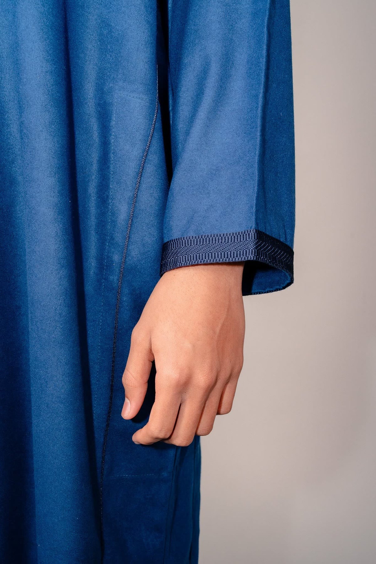 Sleeve cuff detail on a royal blue Moroccan winter djellaba